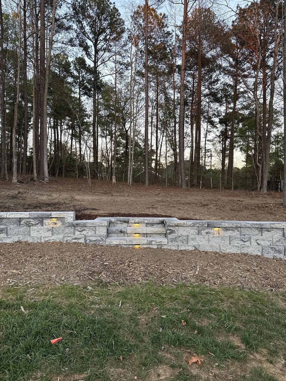 Wide view of the lit steps in the curved wall
