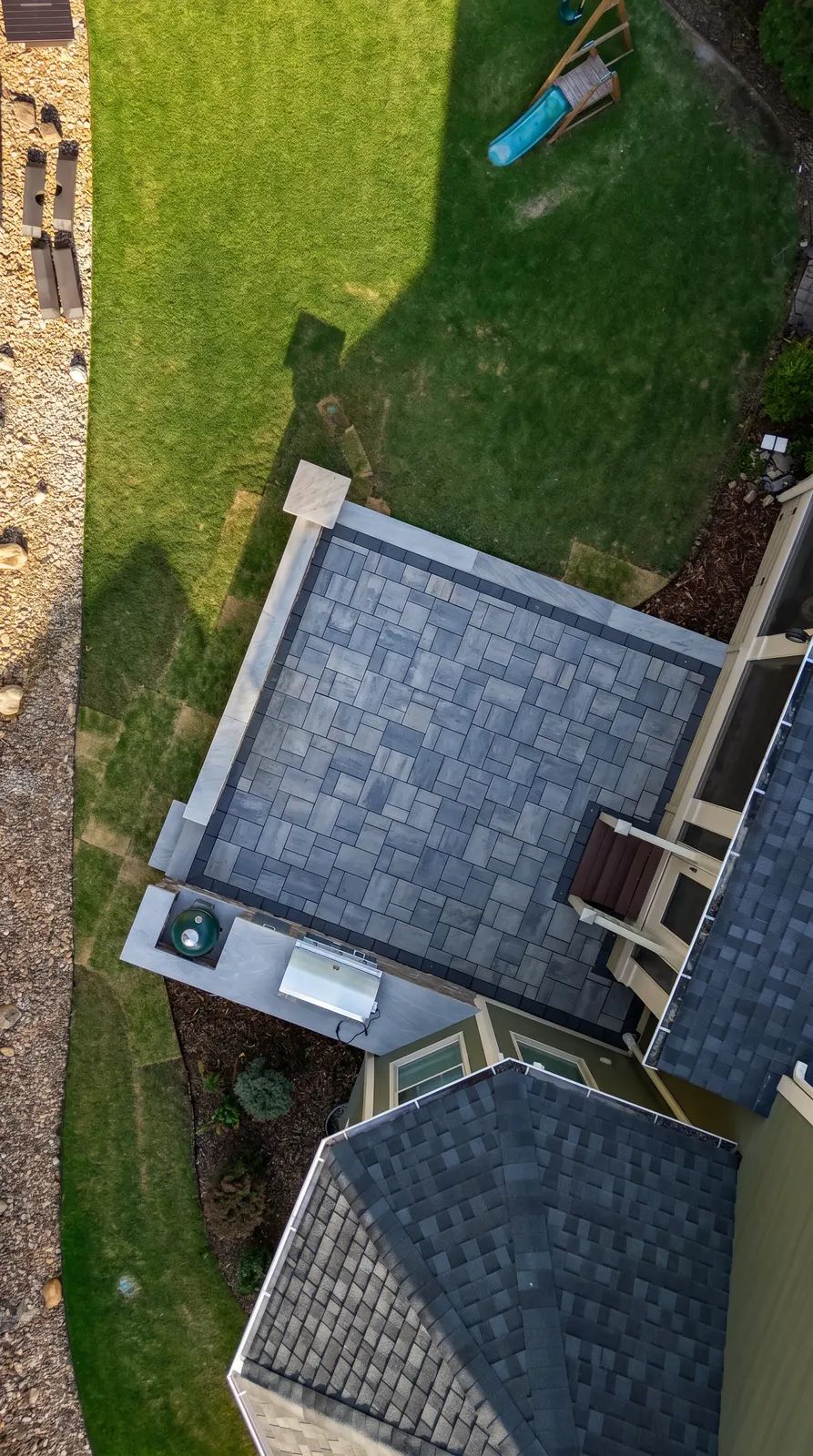 Drone view straight down on the kitchen patio and house
