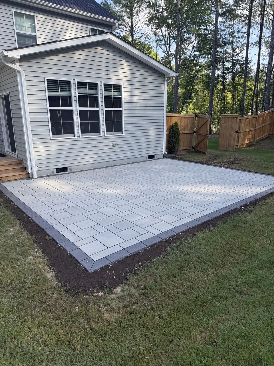 Border corner of the rear patio against the lawn