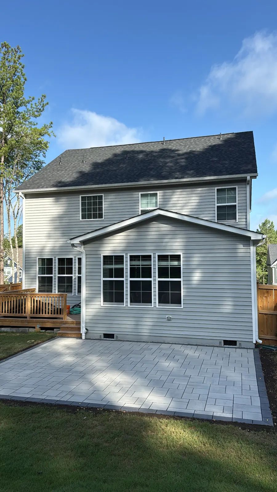 Rear patio by the deck steps
