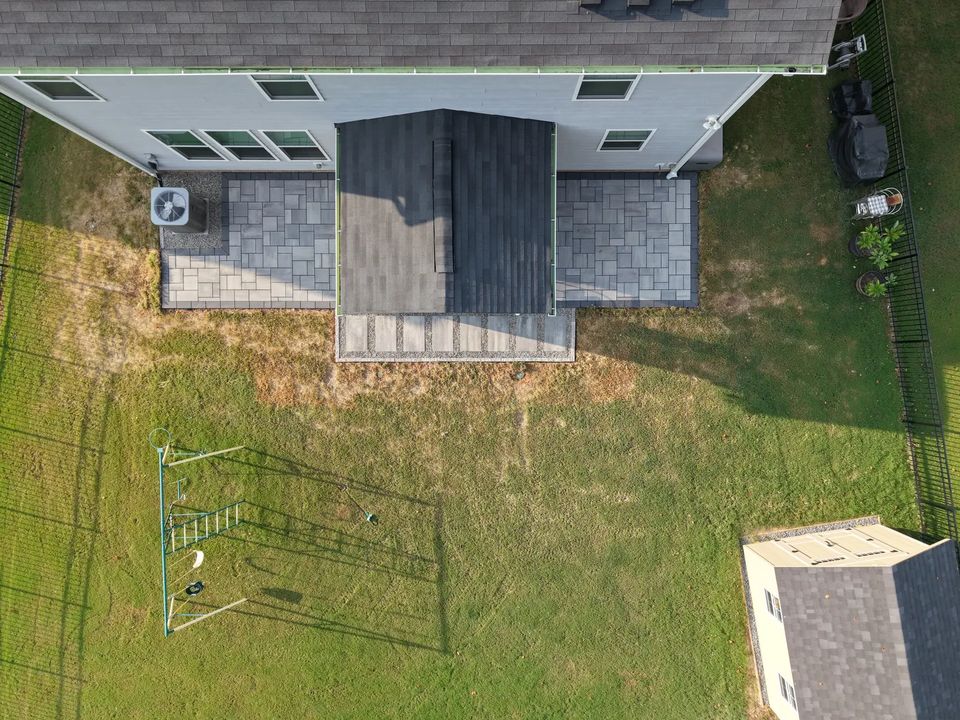 Overhead view of the patio on both sides of the screened porch