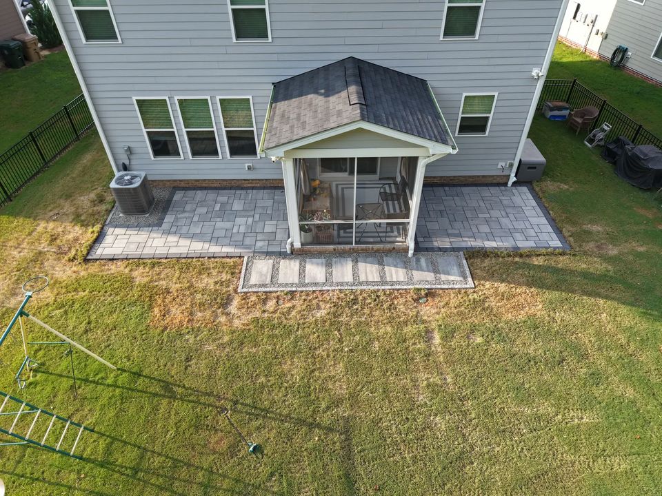 Rear view of the house with the screened porch patio