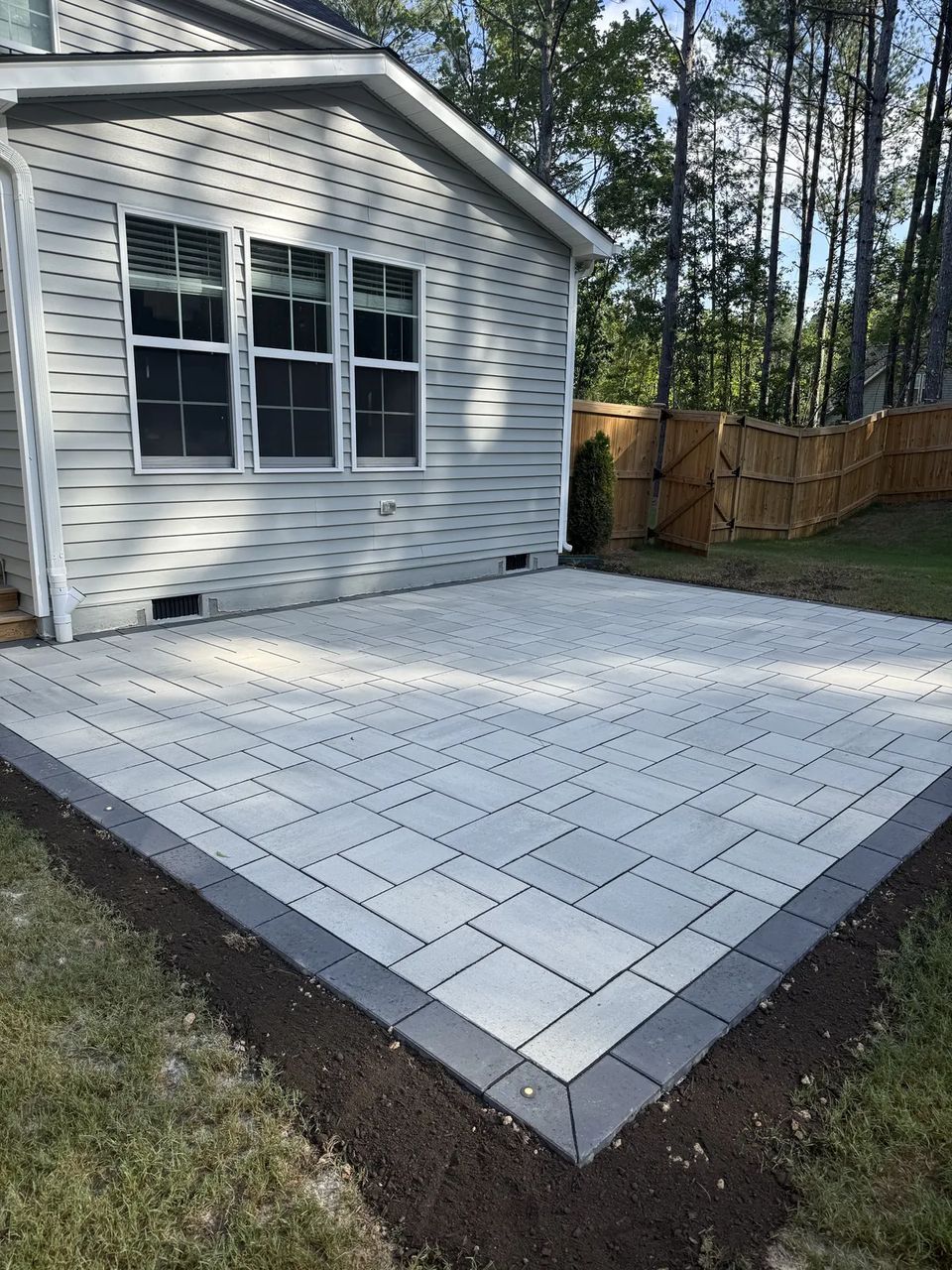 Slab patio with a dark border band