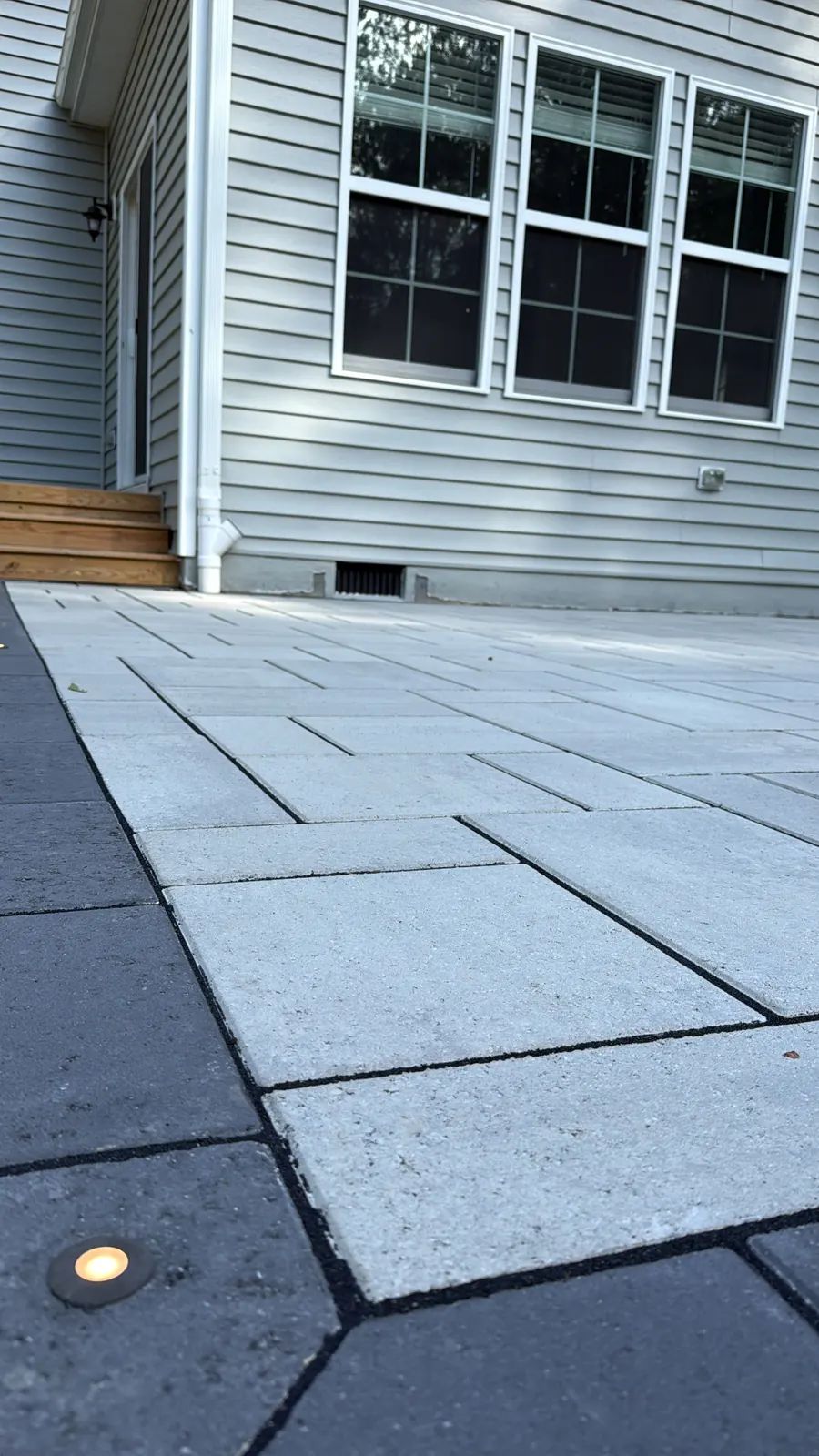In ground light in a slab patio