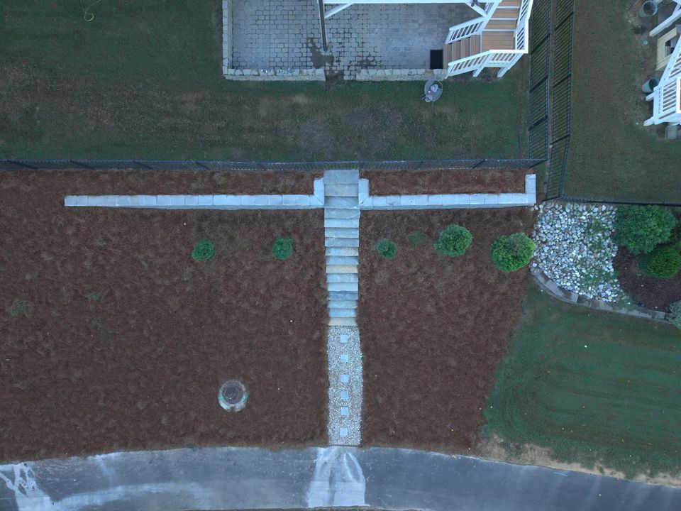 Overhead view of the slope with stairs and a drain line