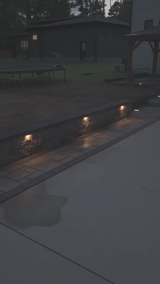 Lit walkway at dusk